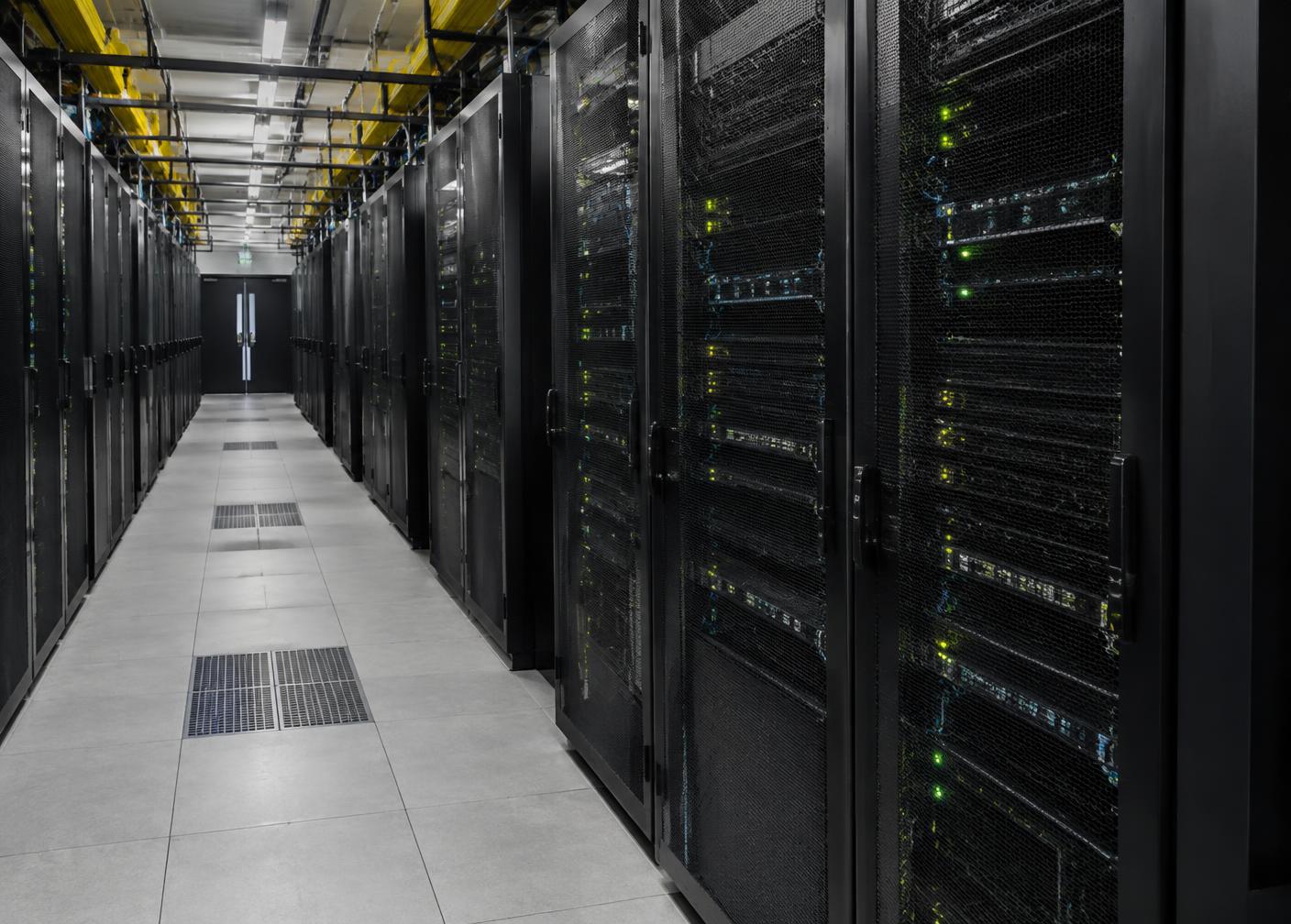 Illustrative photo of server racks in a data centre aisle